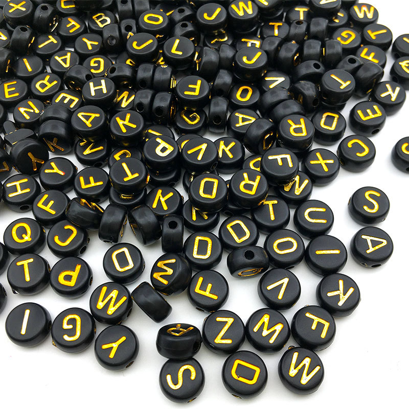 7:Randomly mix 100 black circular gold letters 3.5 * 7mm