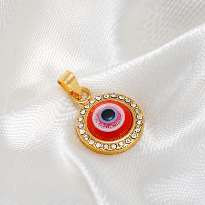Gold red eye single pendant