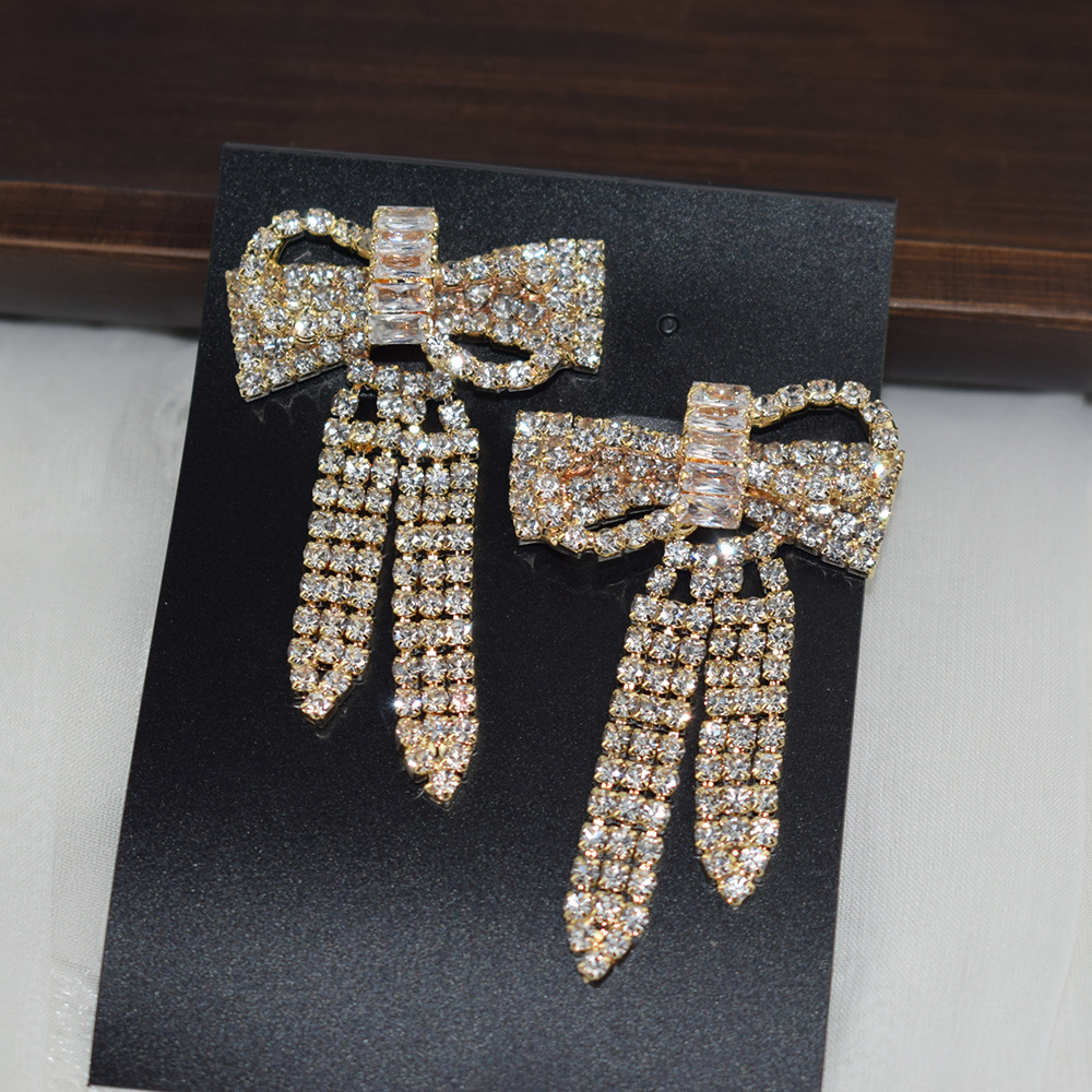 1:Gold stud earrings