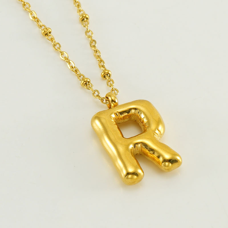 18:The gold letter R