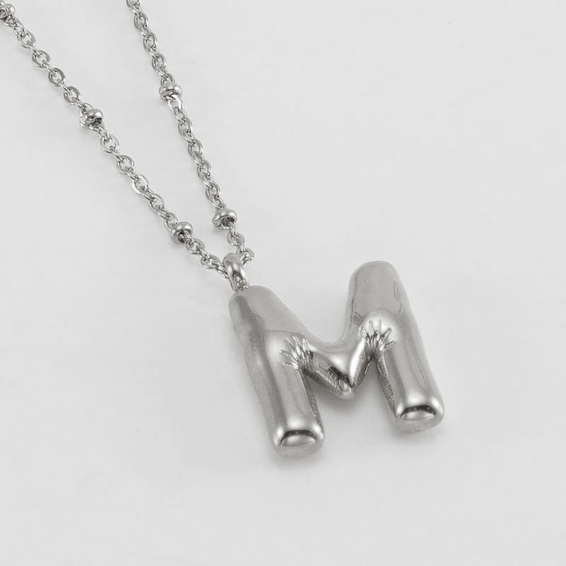 The steel letter M