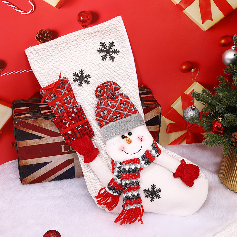 A snowman in red and white stockings