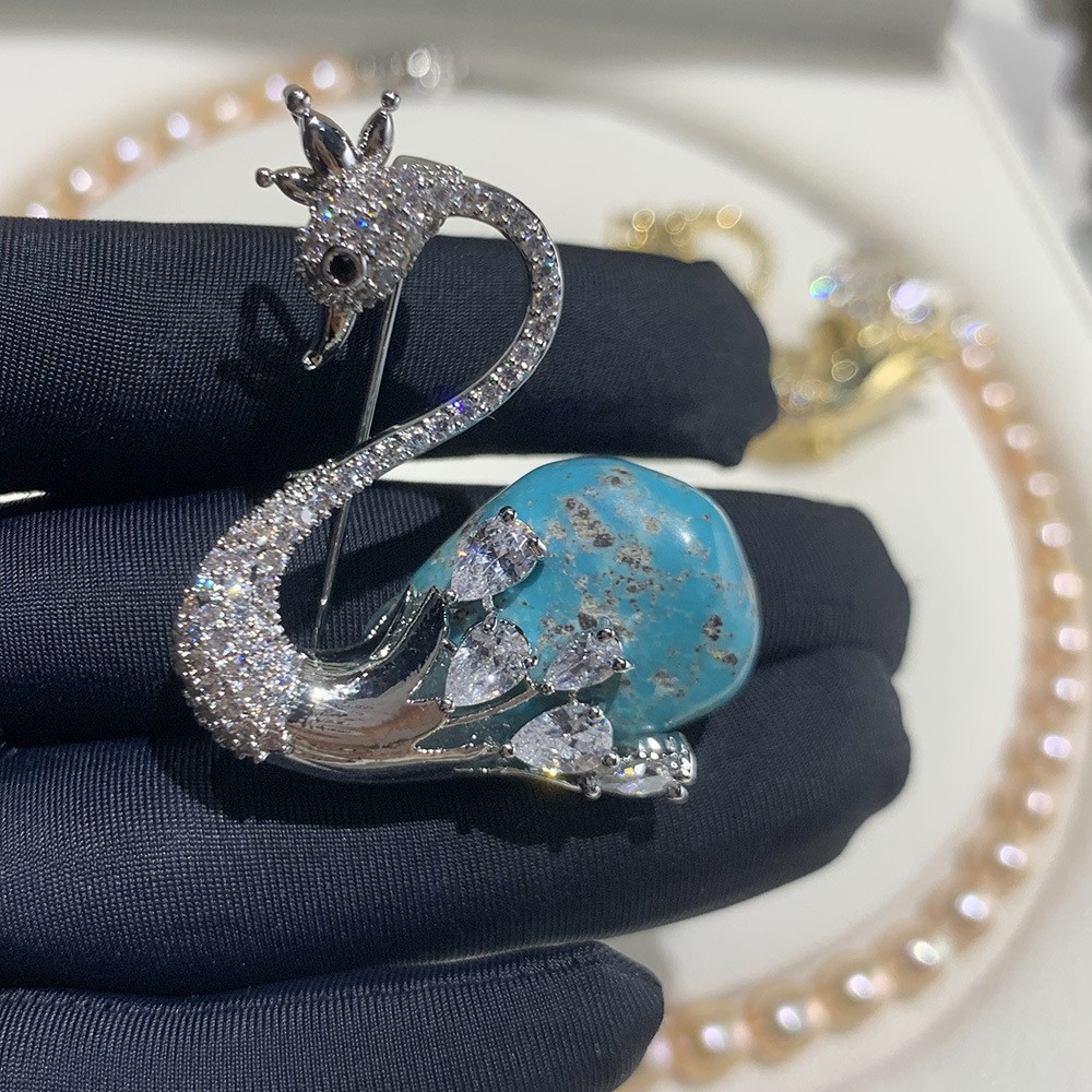 Silver blue turquoise swan