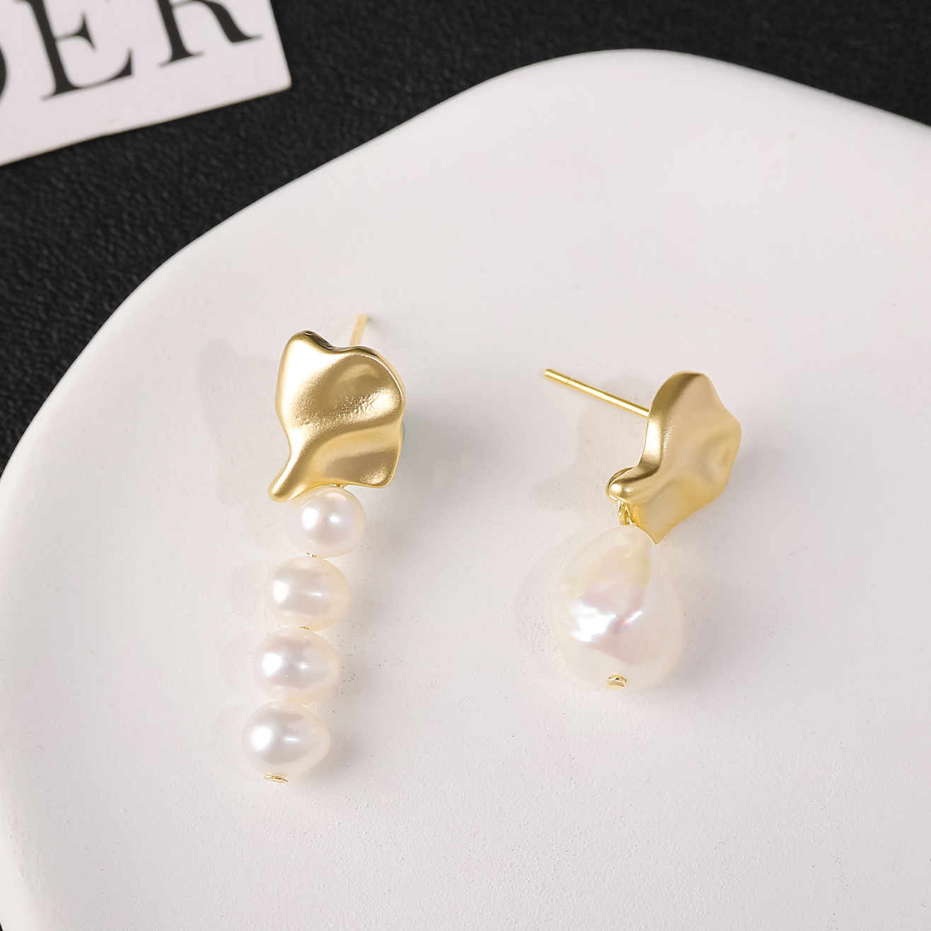 2:Gold stud earrings