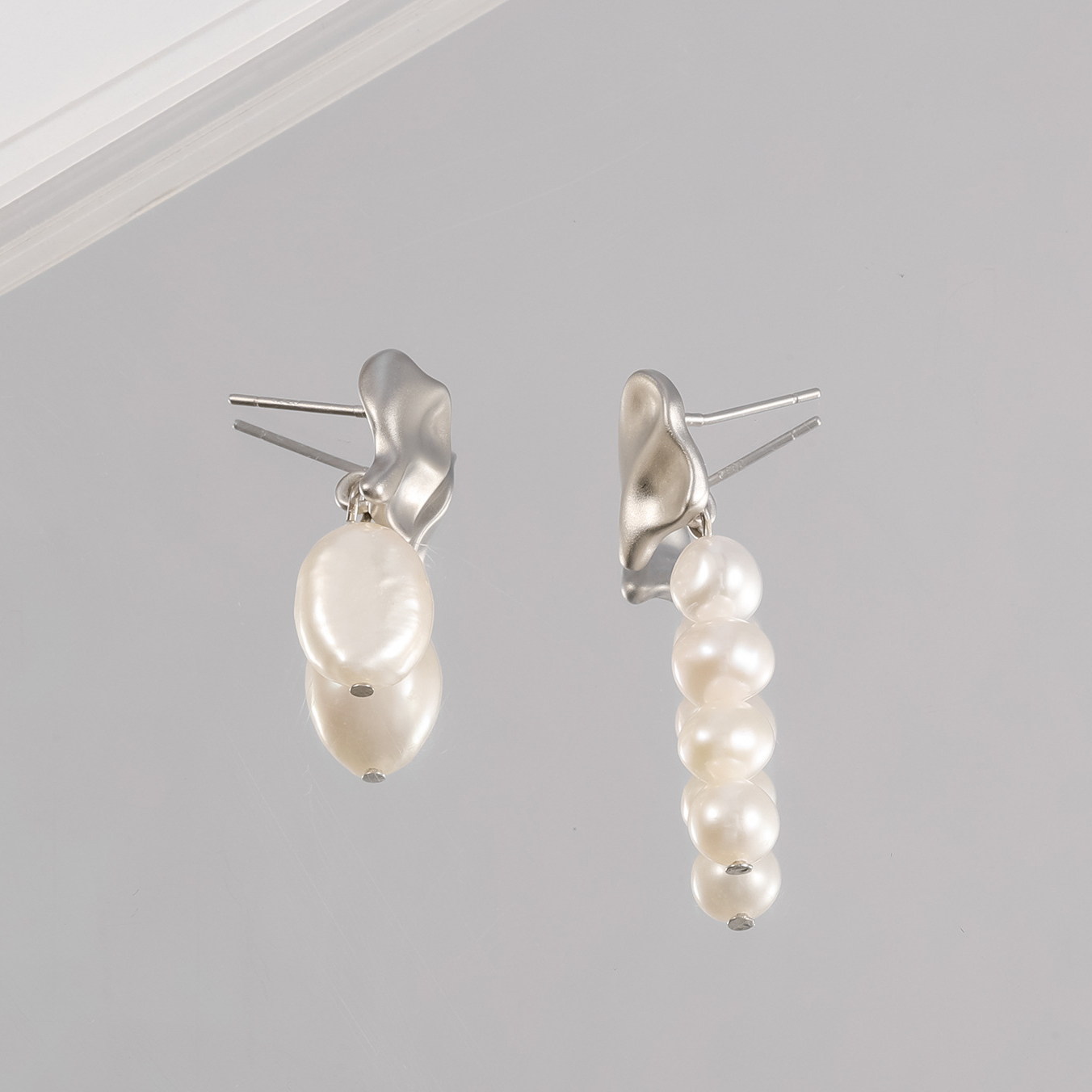 3:Silver stud earrings