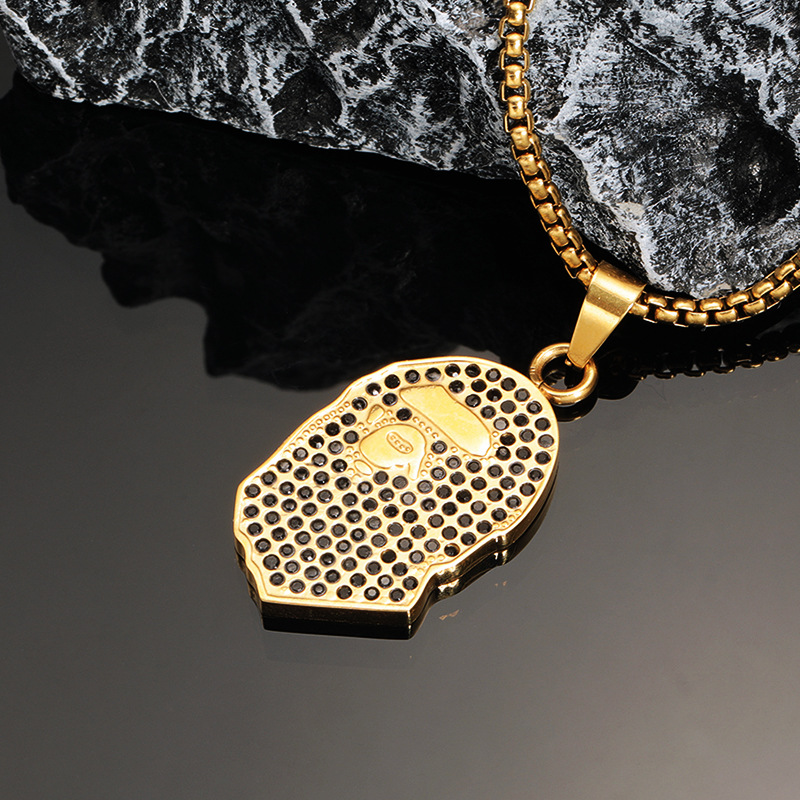 8:Gold and black diamond pendant with pearl chain