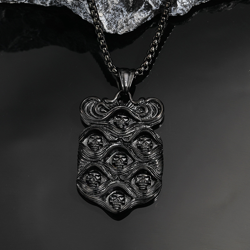 Black pendant with pearl chain