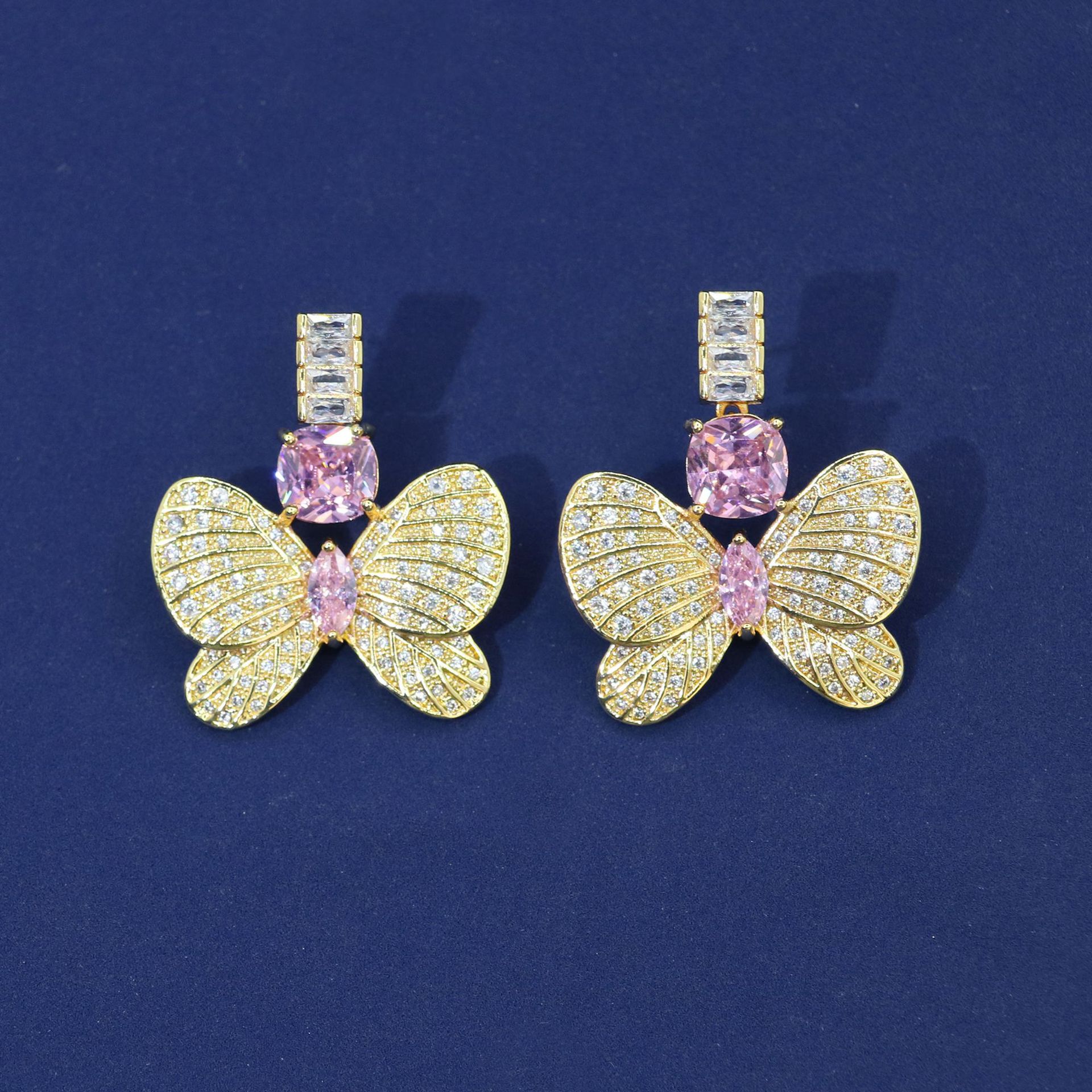 Zirconium earrings with gold foundation