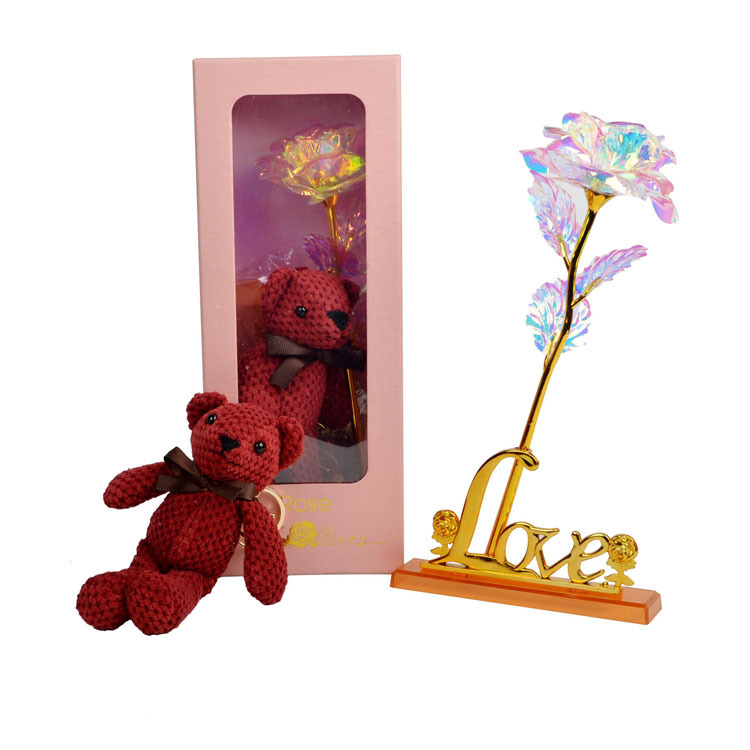 Pink gift box with gold primary   Red teddy bear   base