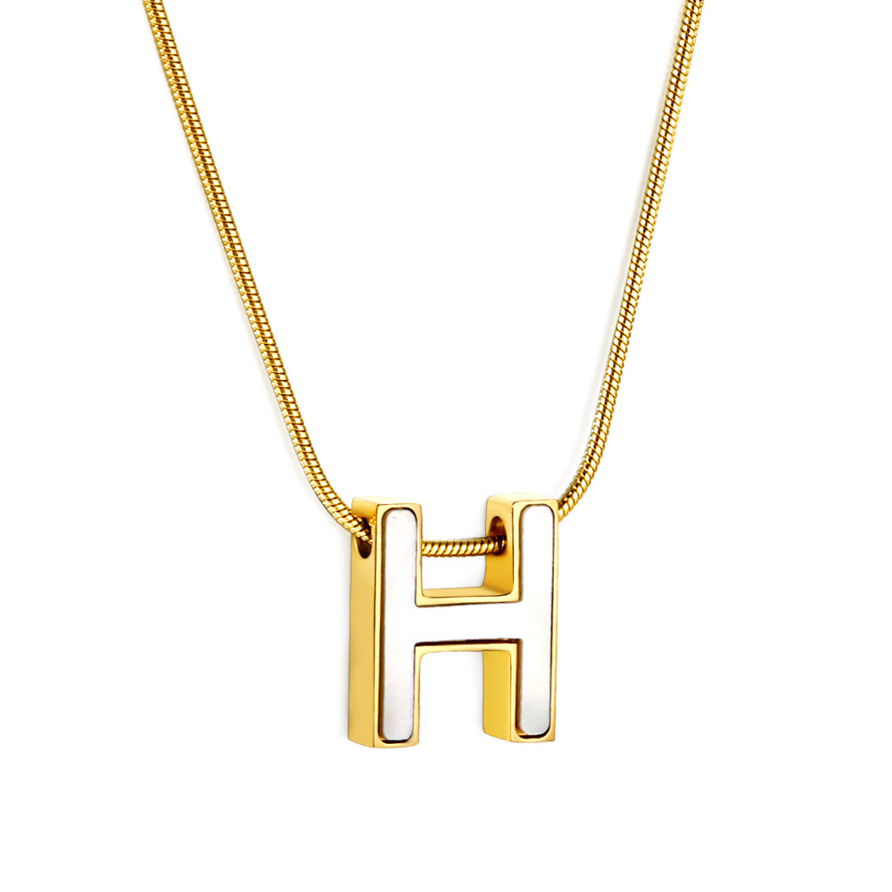 H Necklace with white shell pendant