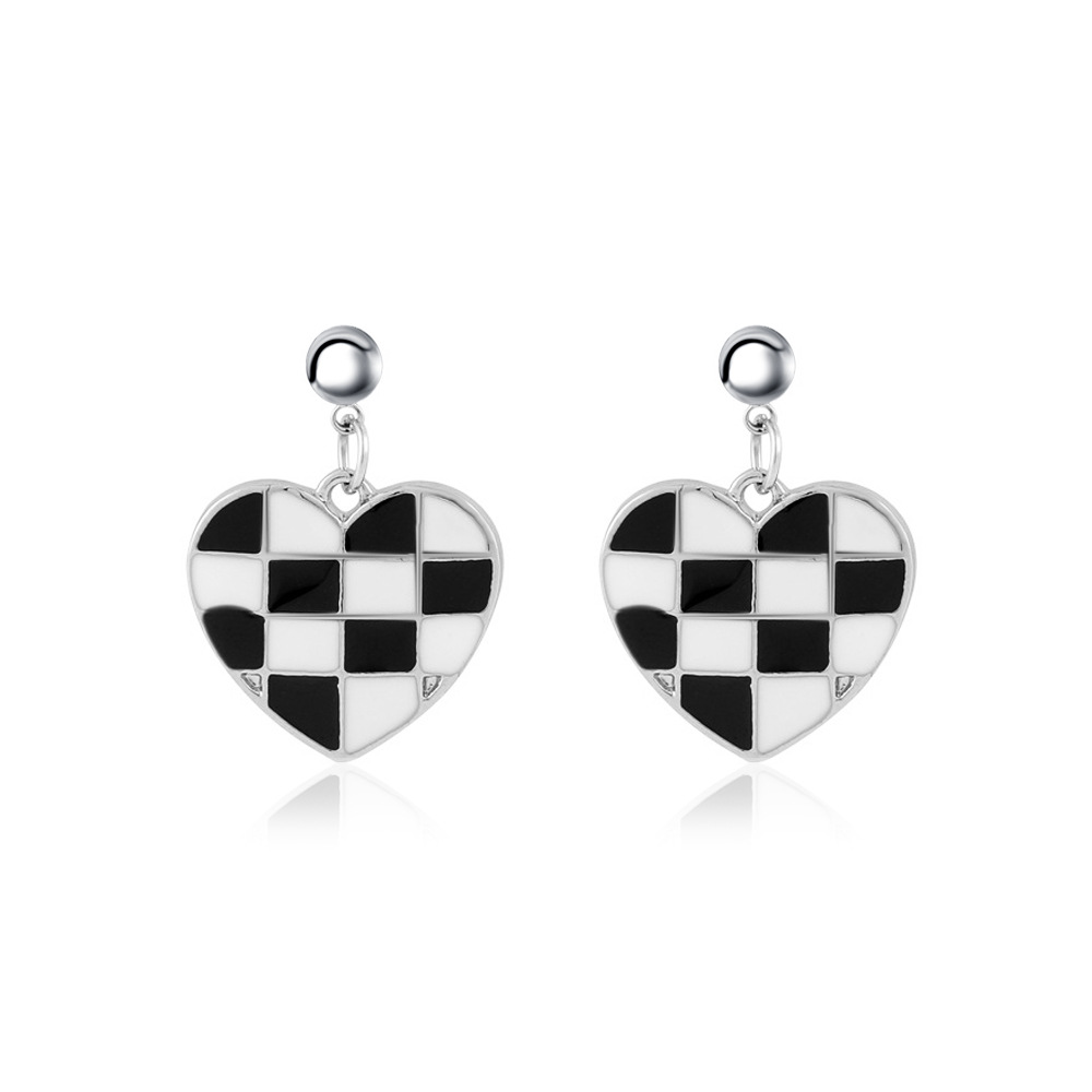 4:Black and white stud earrings