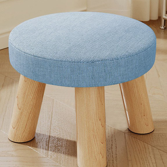 Blue three-legged solid wood round stool is removable