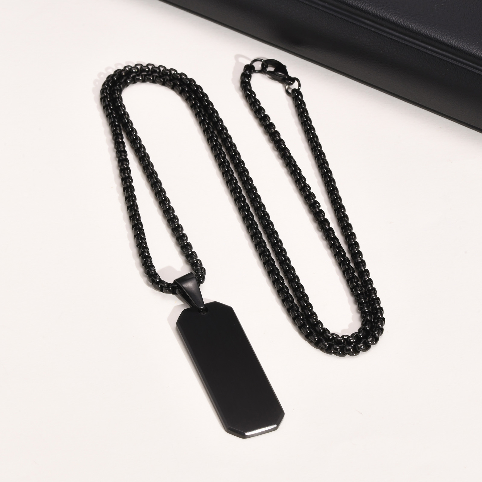 Black pendant with chain