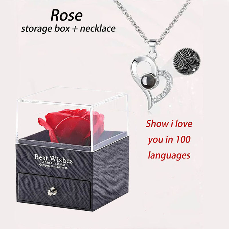 Black box and silver love necklace