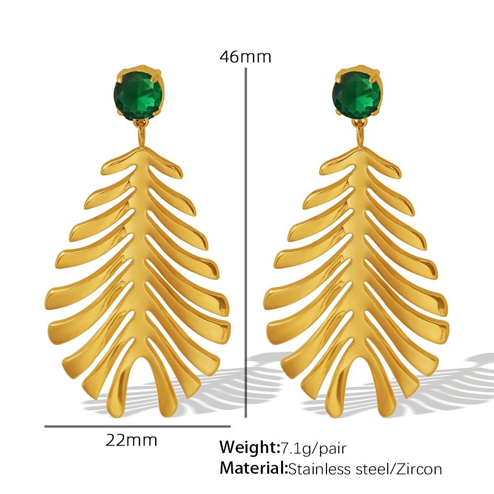 Green zircon gold