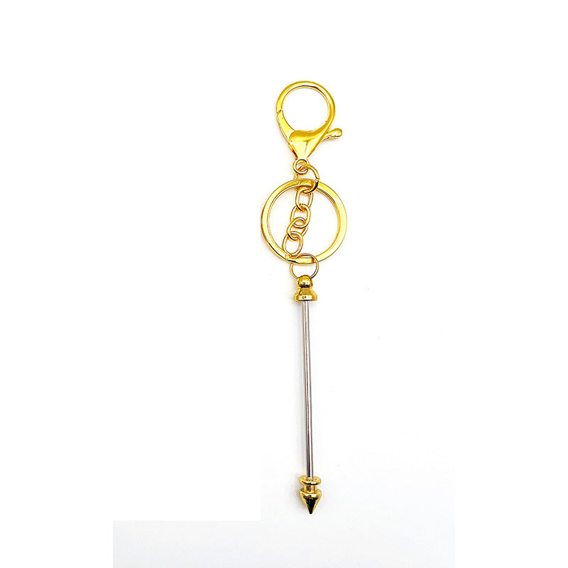 Bullet head gold   three-piece key chain