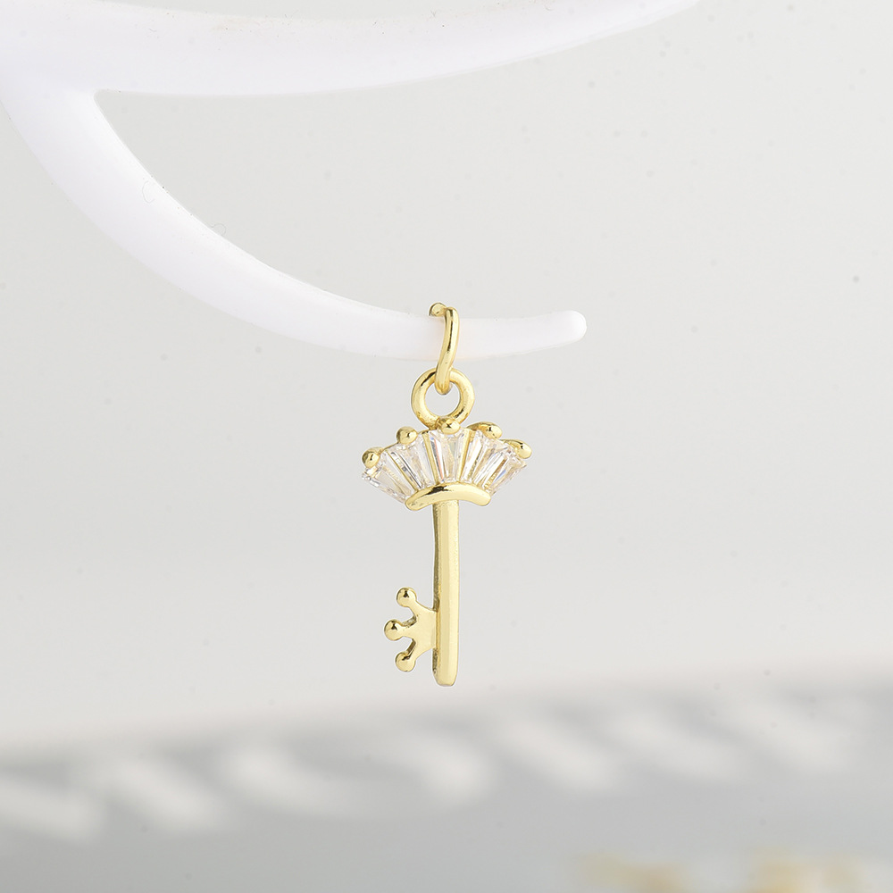 2:Gold key pendant