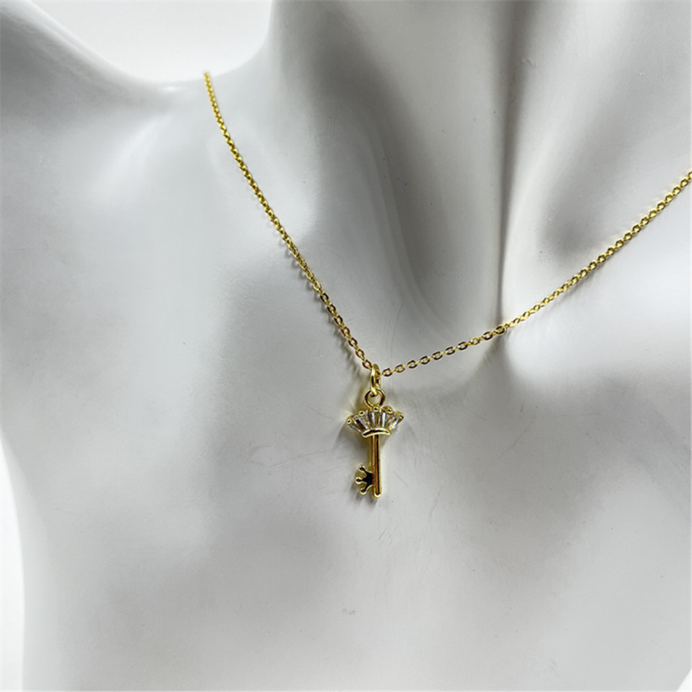 4:Gold key necklace