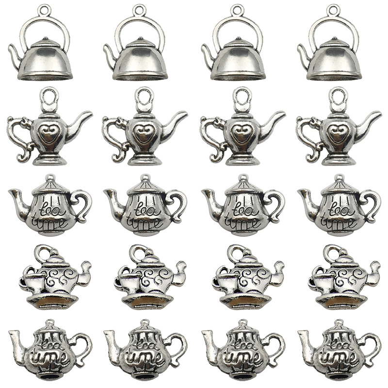 6:Mix 20 old silver teapots