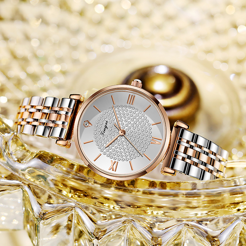 Between gold and white dial
