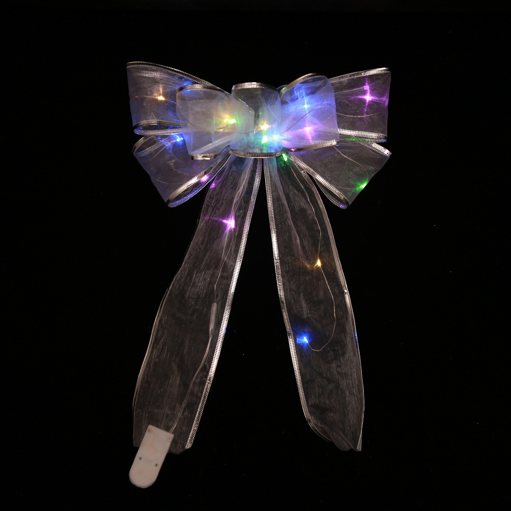 Silver bow   colored light