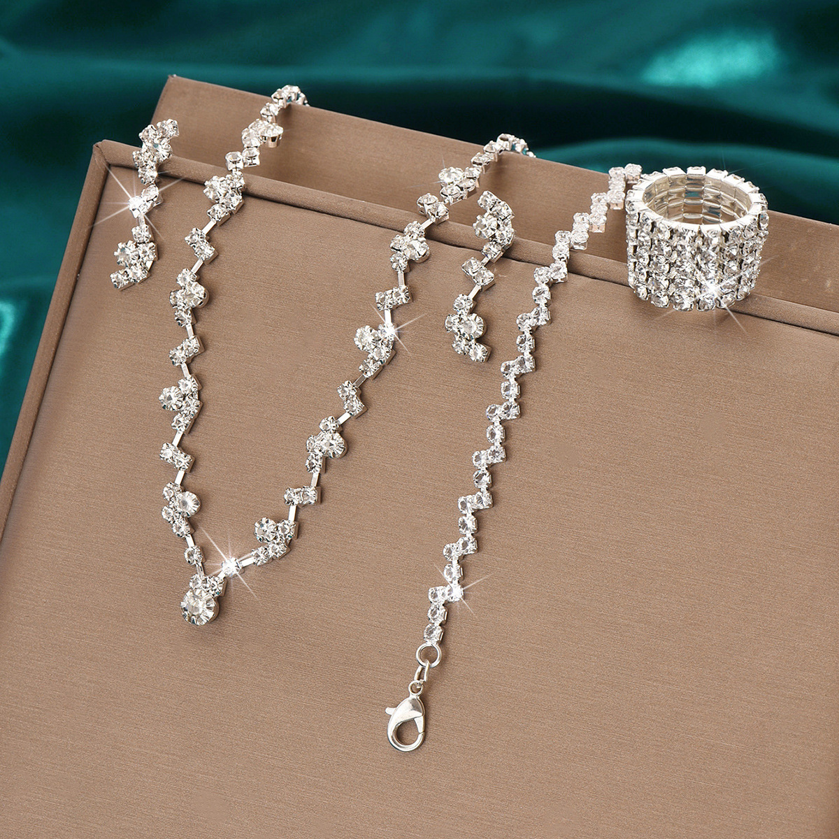424785424-5 Silver necklace earrings bracelet ring set