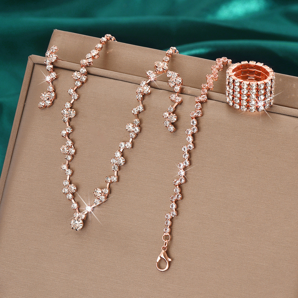 424785424-5 Rose gold necklace earrings bracelet ring set