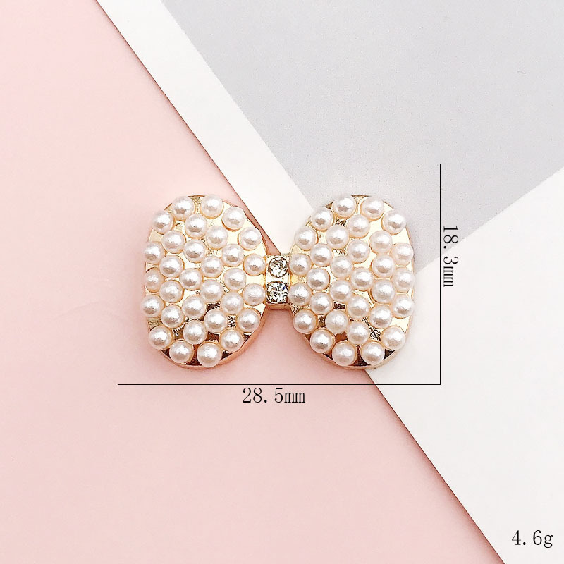 D1590 Gold pearl bow
