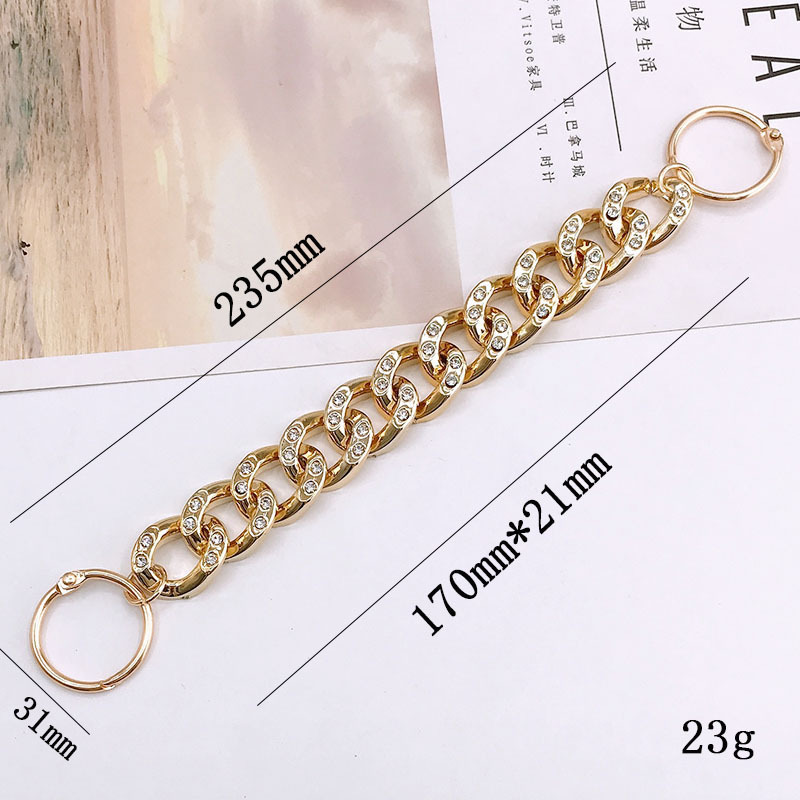 K1586-11 diamond-set acrylic (gold) hanging buckle