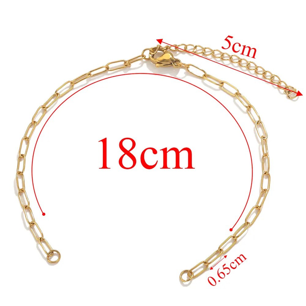 bracelet - 2.5 long cross - gold