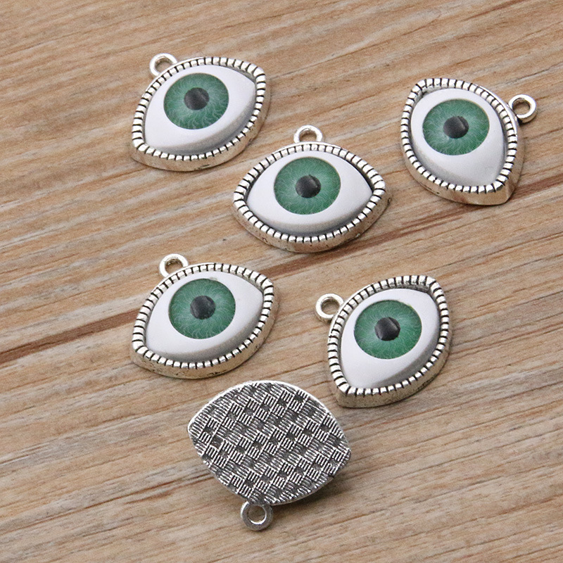 Ancient silver -Green eye