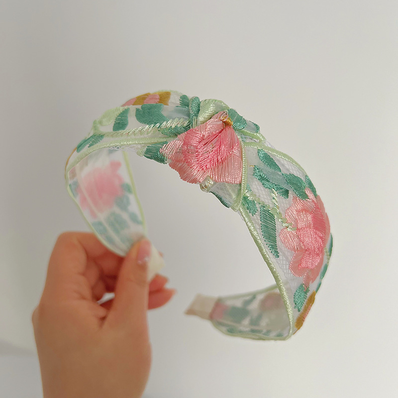 Green-pink embroidery knotted headband