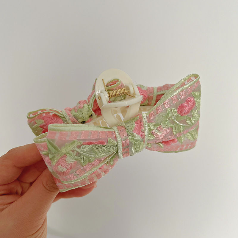 Pink embroidery bow clip