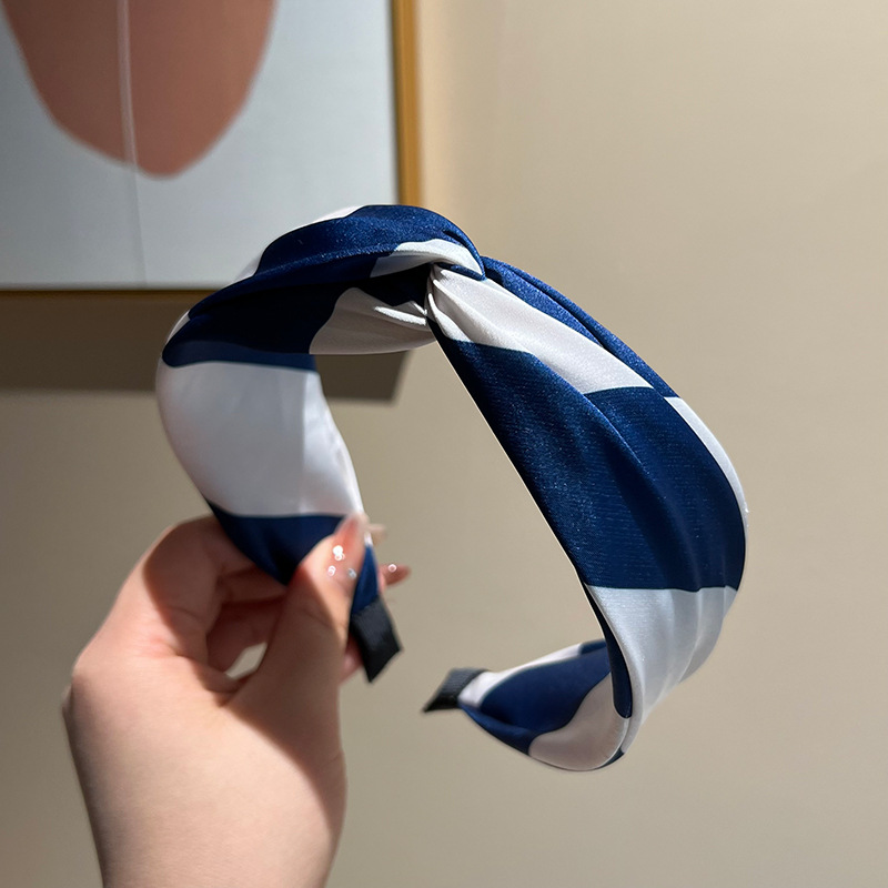 Dark blue cross headband