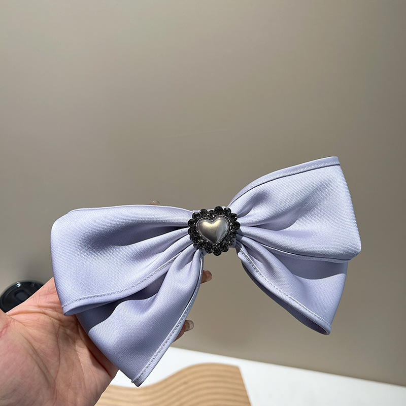 Purple heart bow spring clip