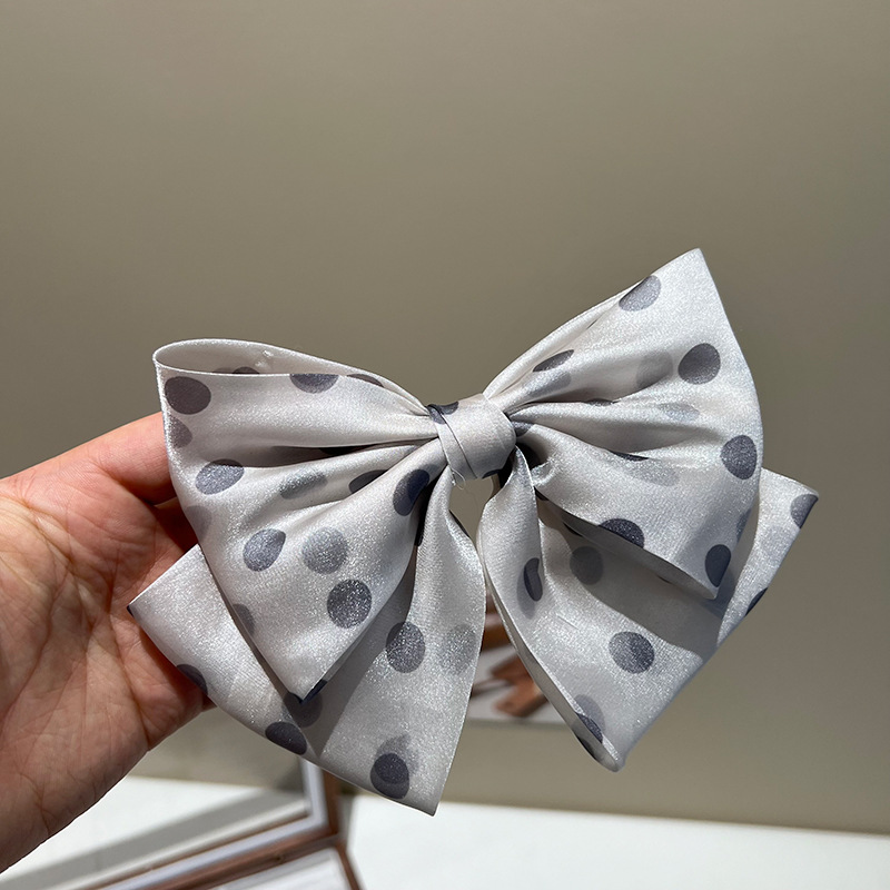 Gray polka-dot bow hair clip