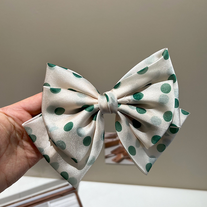 Green polka-dot triple bow hair clip