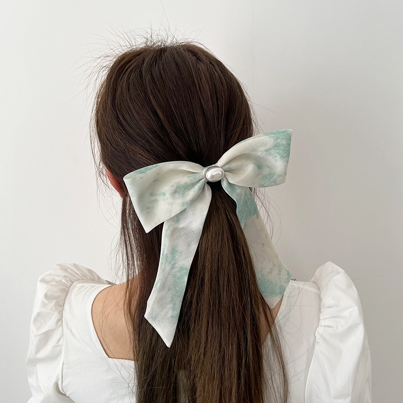 Blue tie dye pearl bow hair clip