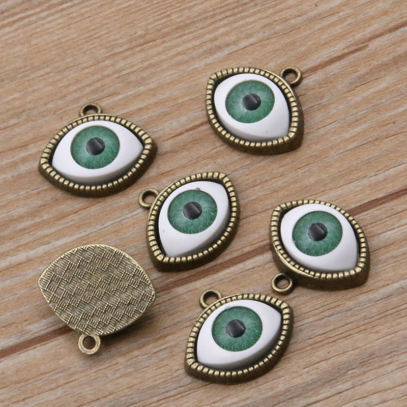 Antique bronze color -Green eye