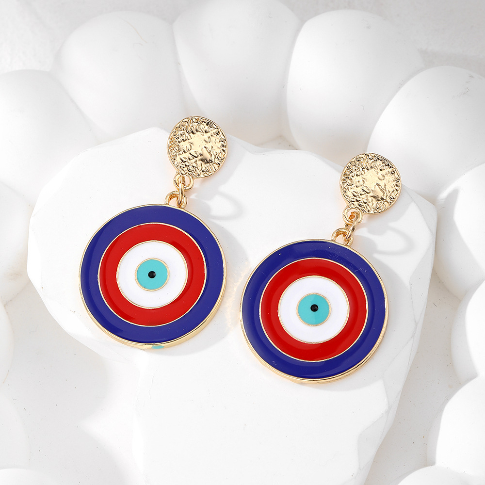Red and blue round earrings