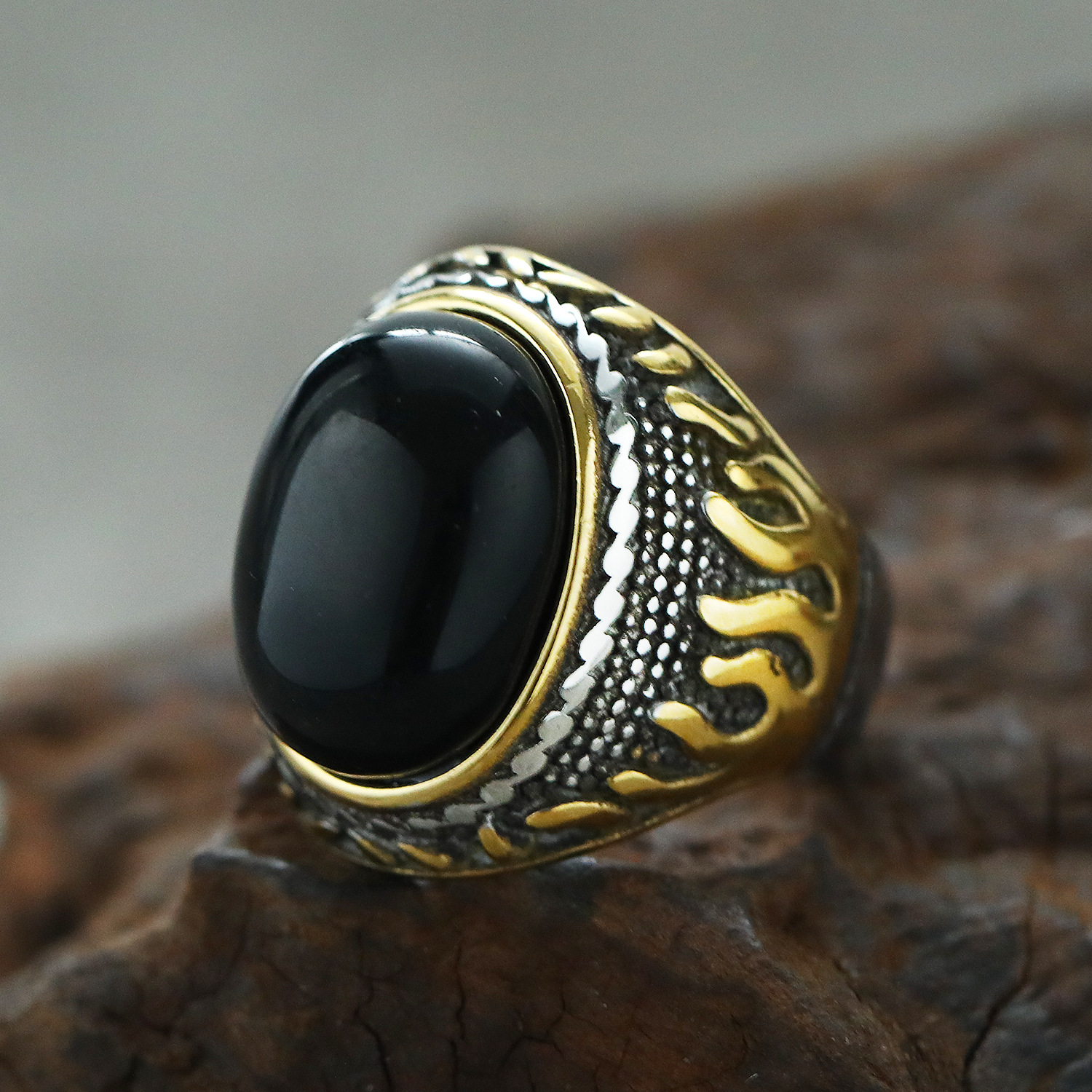 Steel and gold black stone