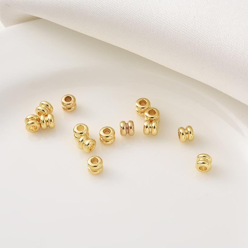 Gold double bead - Outer diameter 4MM Height 3.5MM aperture 1.8MM