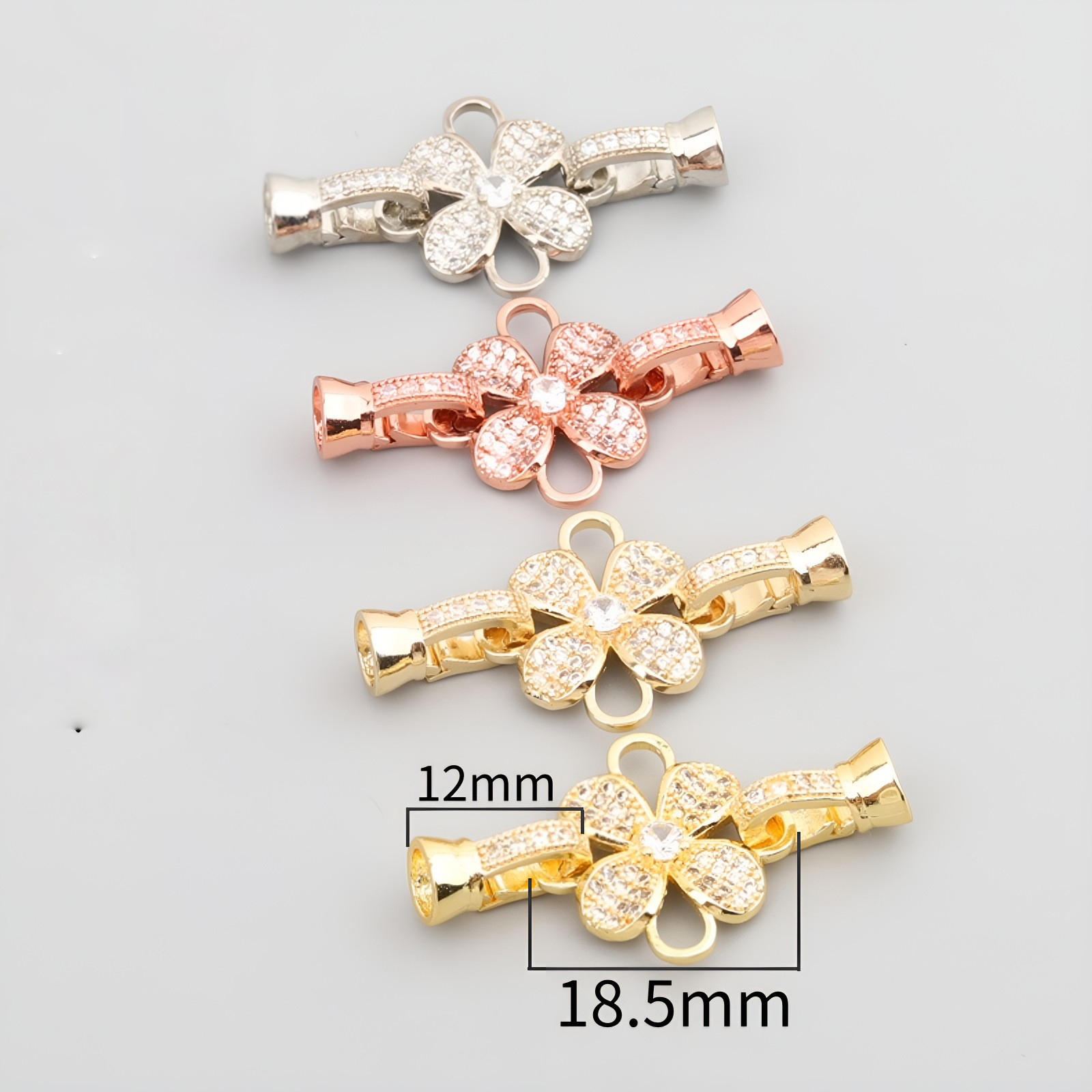 Flower-shaped button white gold/color preservation