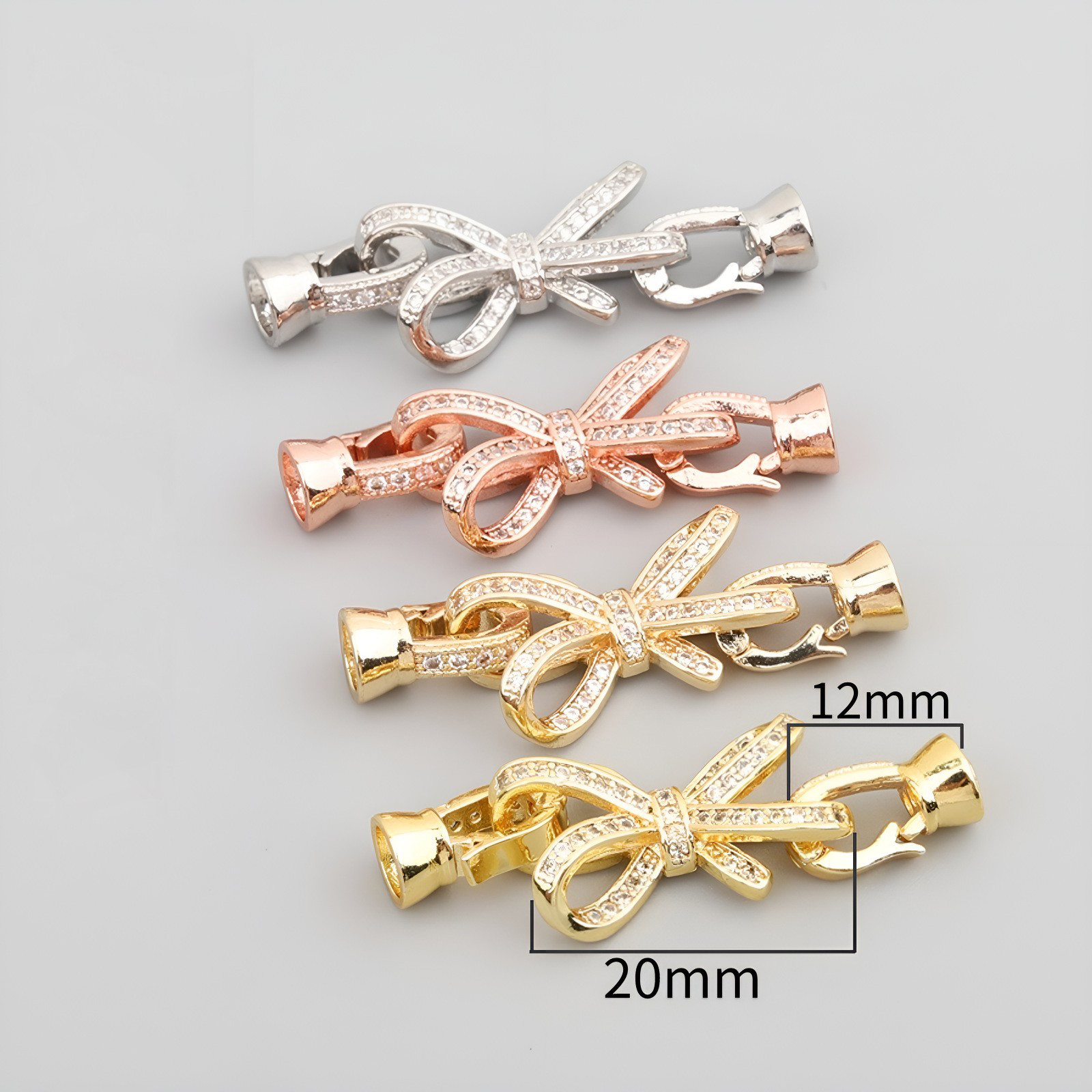 25:Bow buckle 18K gold/color preserving