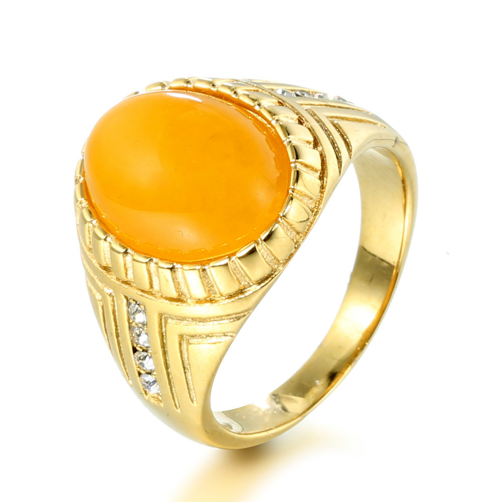 Yellow gemstone with gold background