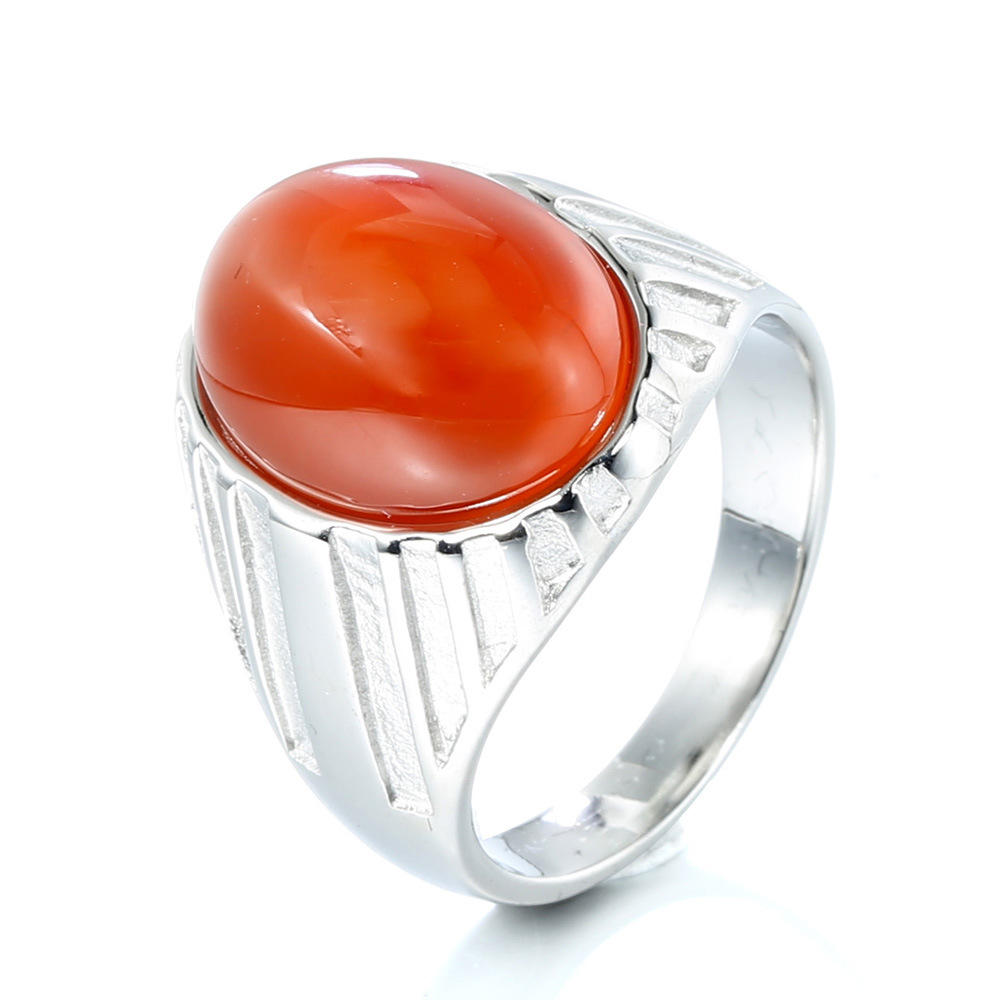 Red gemstone with steel background