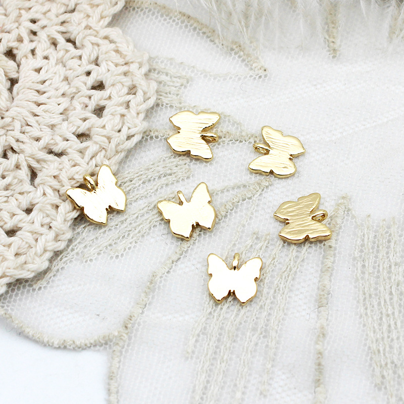 Butterfly 8.8 * 8.9 mm gold