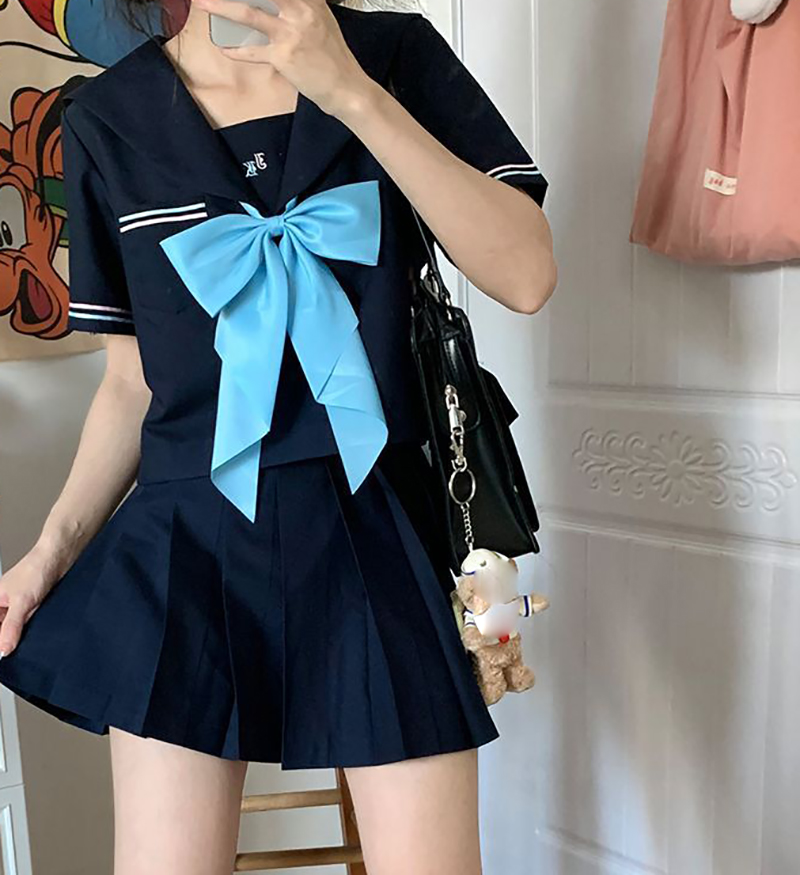 Short sleeve top   navy blue umbrella skirt   blue bow tie