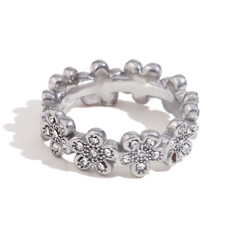 6:Daisy ring. - Steel. - Size 8