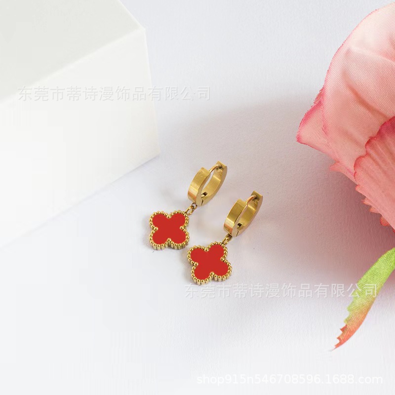 Toothed earrings in red